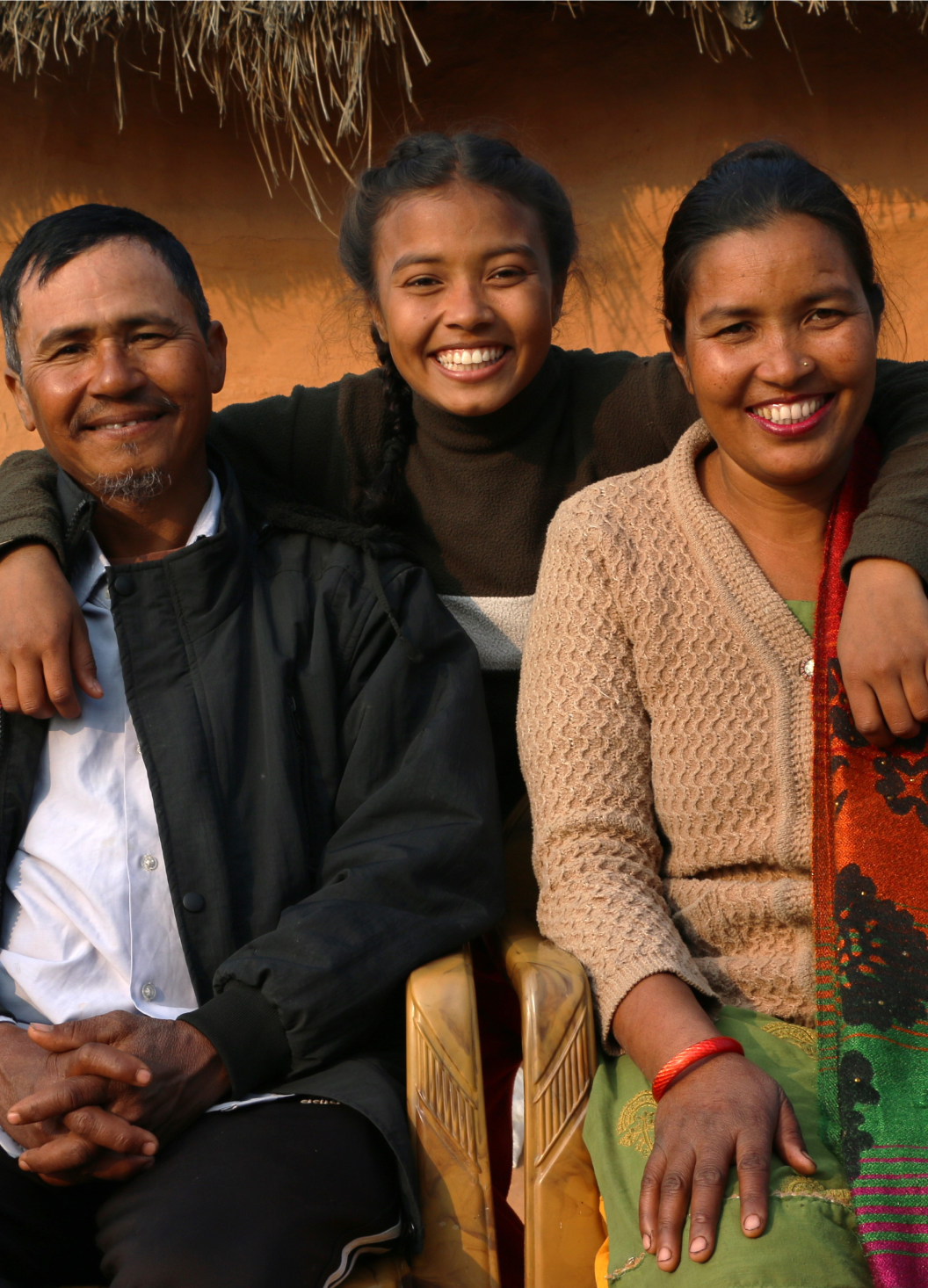 A girl with her family in Nepal.