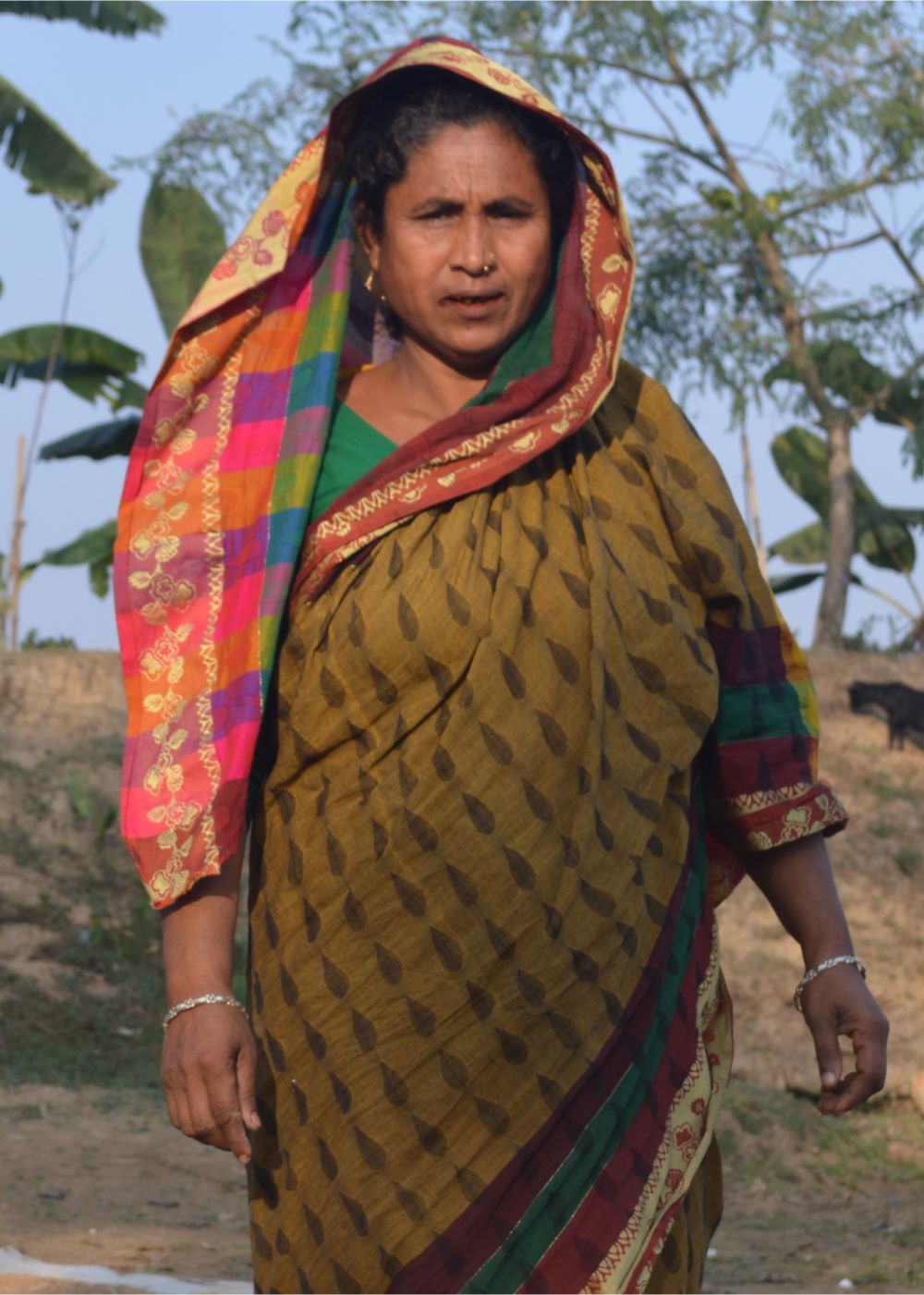 Shorufa, a communtiy leader standing in Bangladesh.