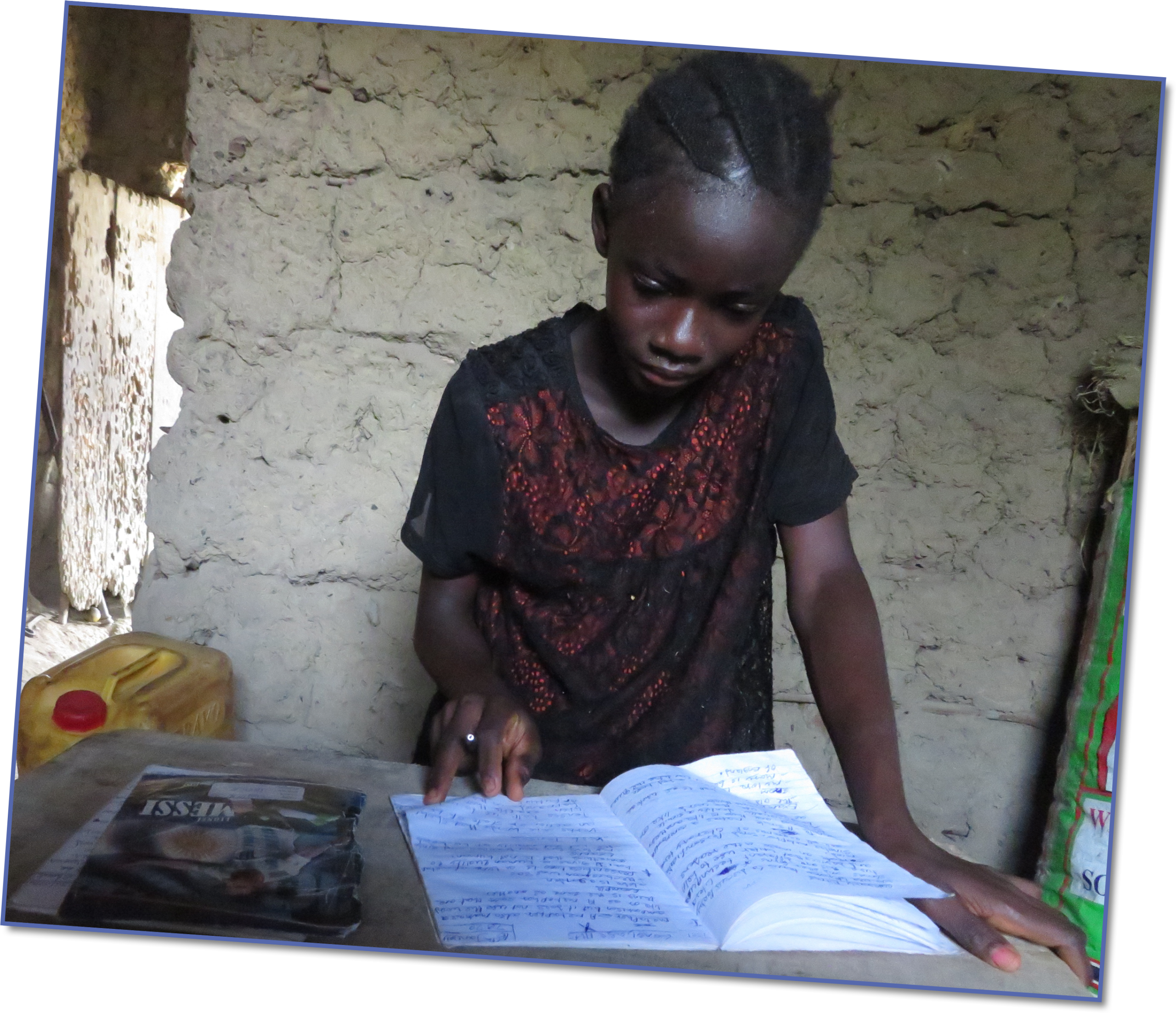 With the school materials supplied by ActionAid, Martha is studying hard to pass her exams so she can become an accountant