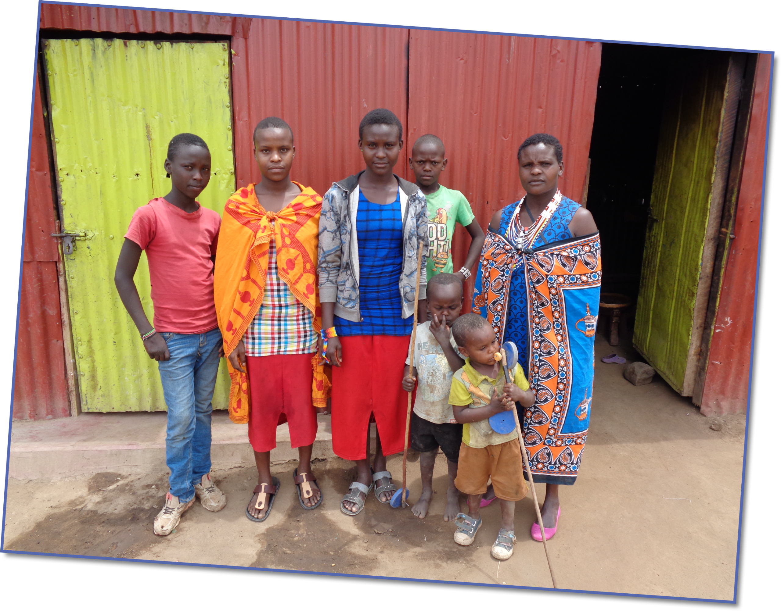 Learning new bee keeping skills means that Elizabeth (far right) is no longer struggling to provide for her children’s needs.