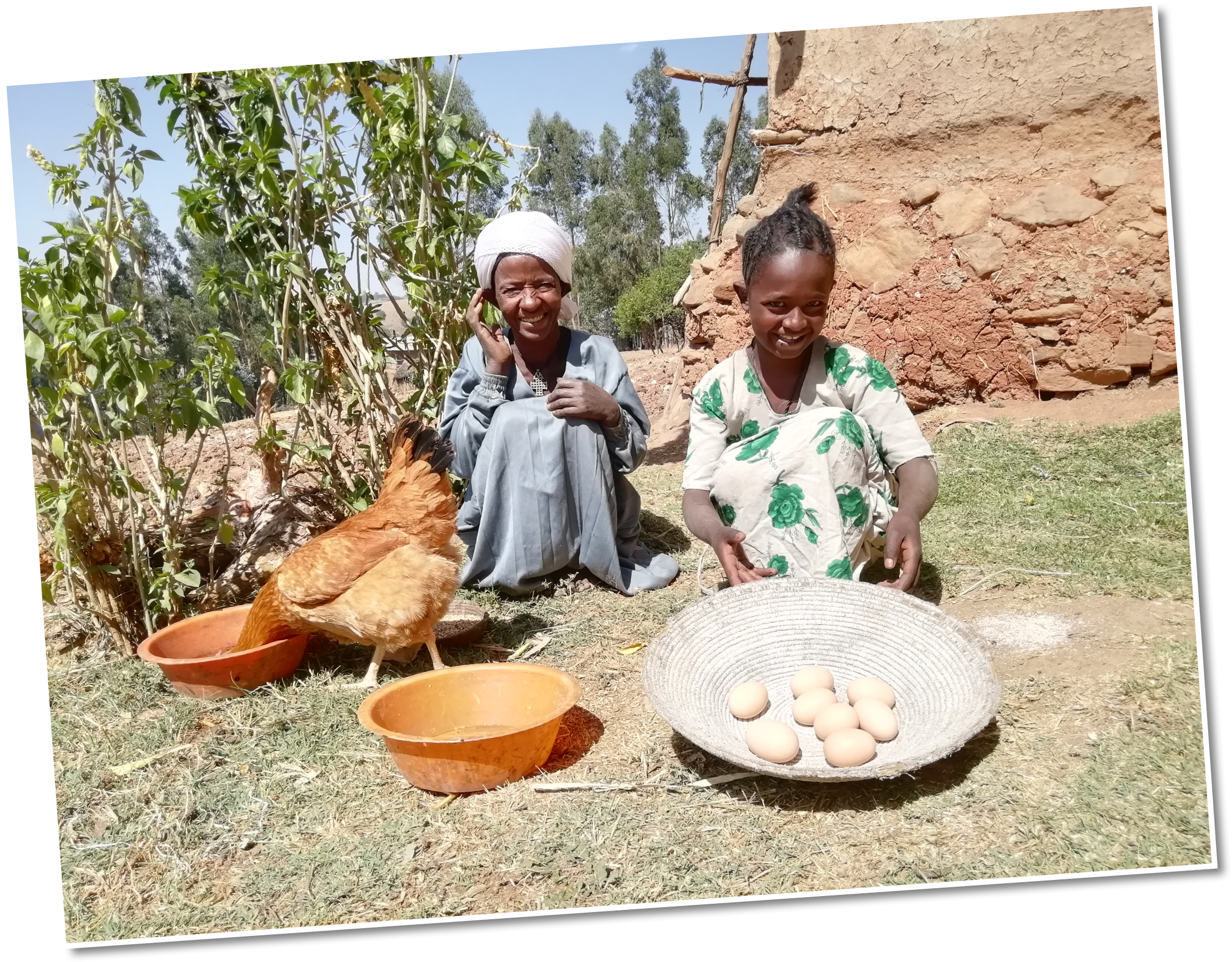 Adanech with her daughter Fantaneshe collecting eggs to sell