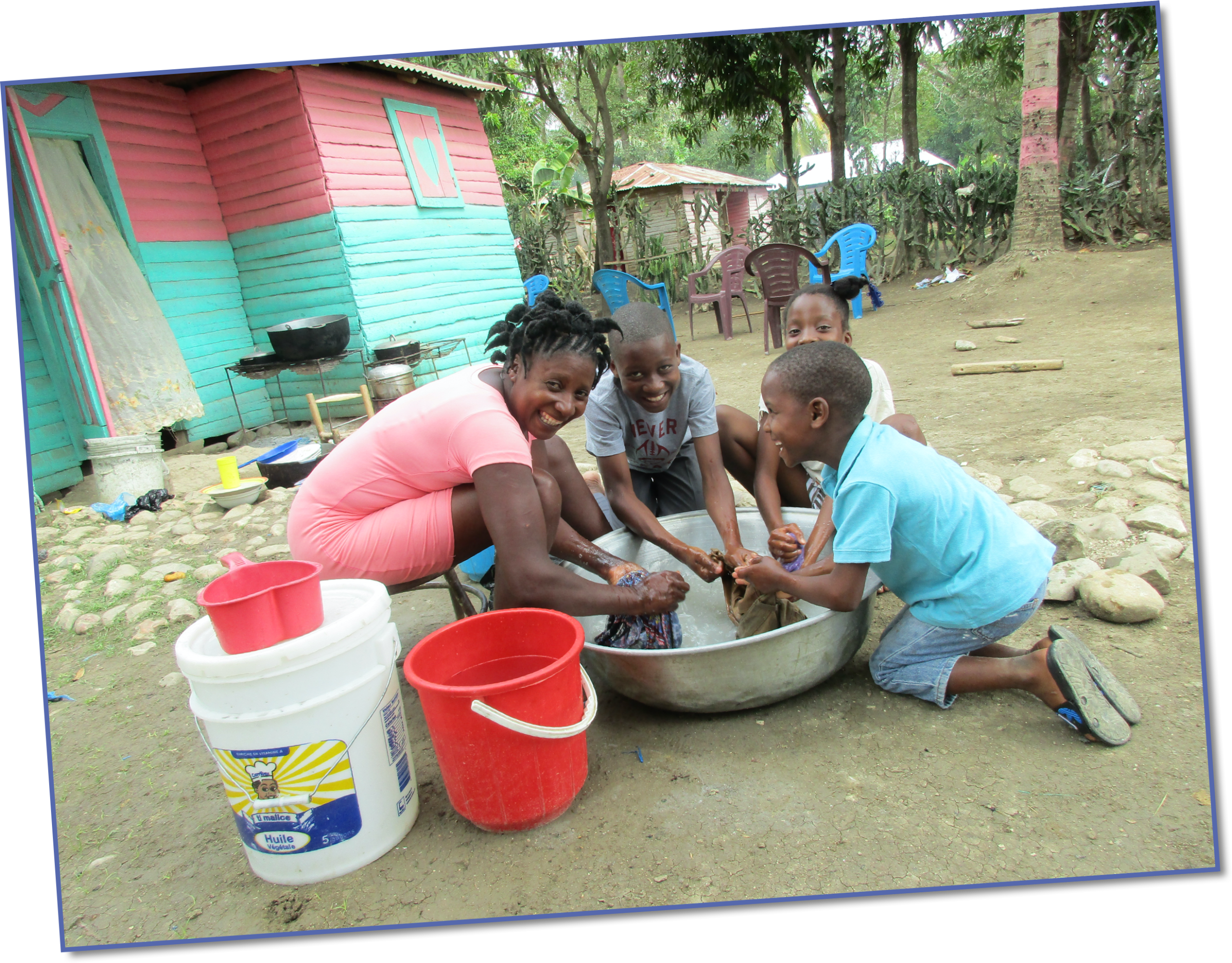 Denise and her children now have access to safe, clean water in their village
