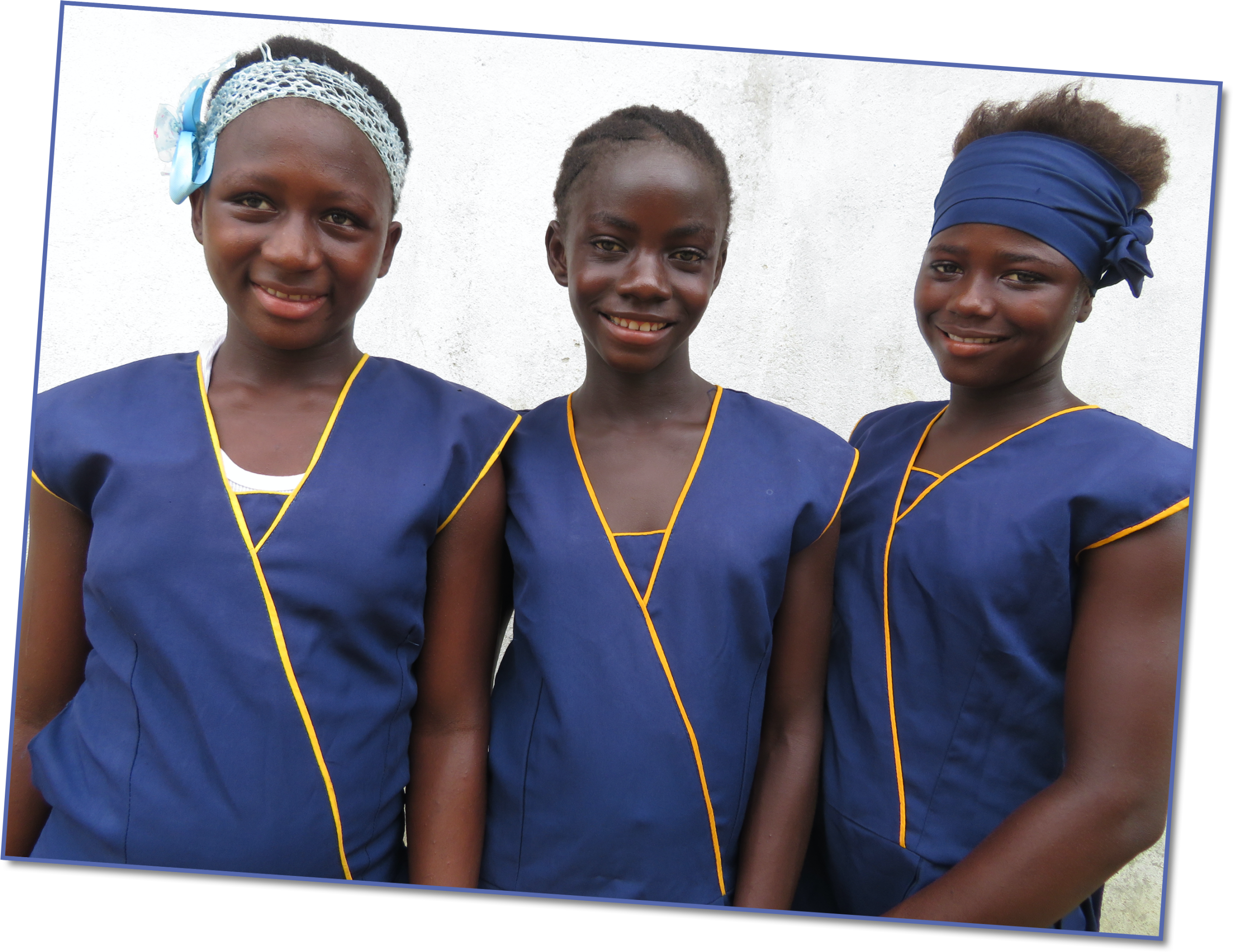Baindu, Martha and Fatu (left to right) have learned that they have the same rights as boys to receive an education