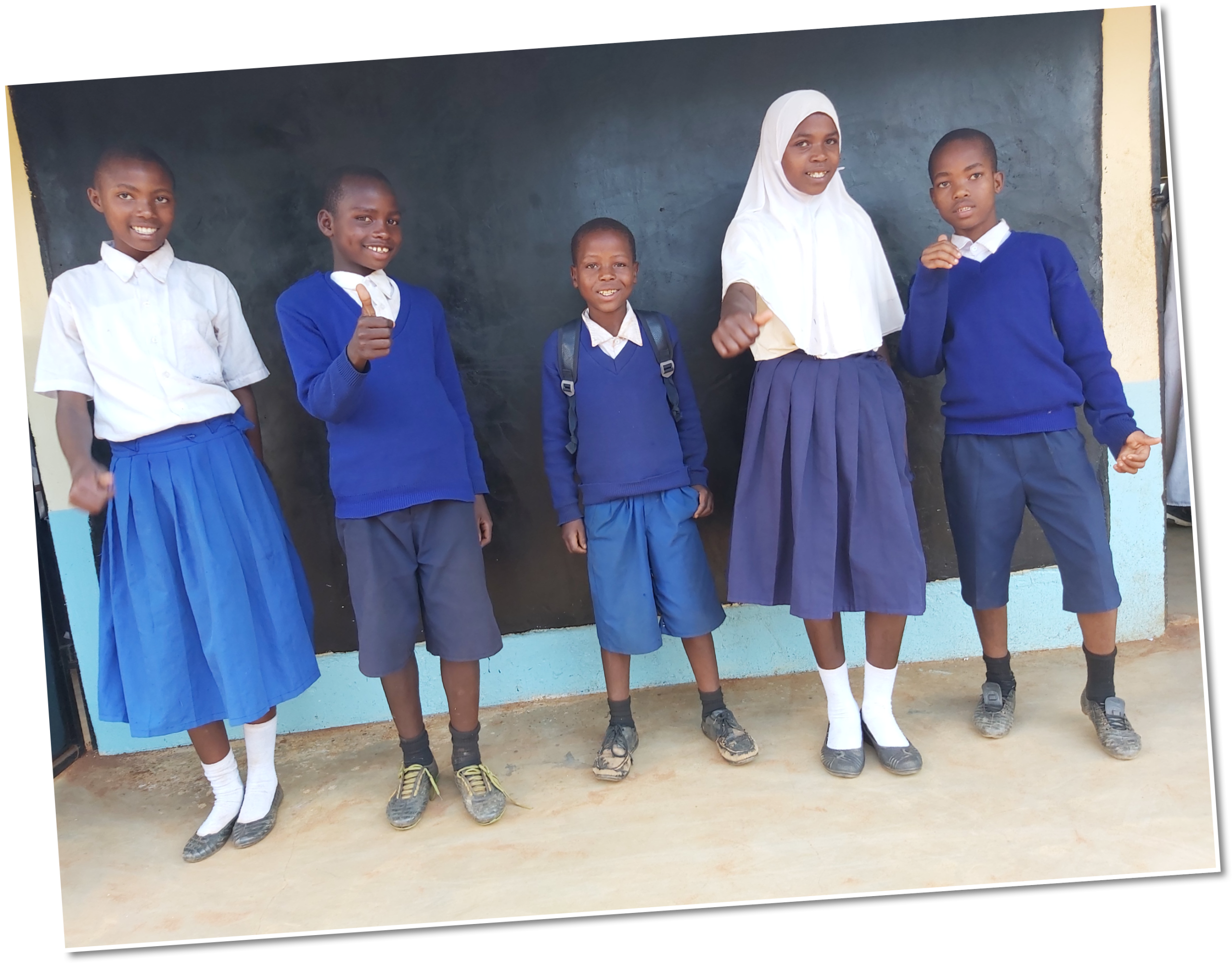 Samia (second from right) and her classmates can now enjoy their newly built classroom