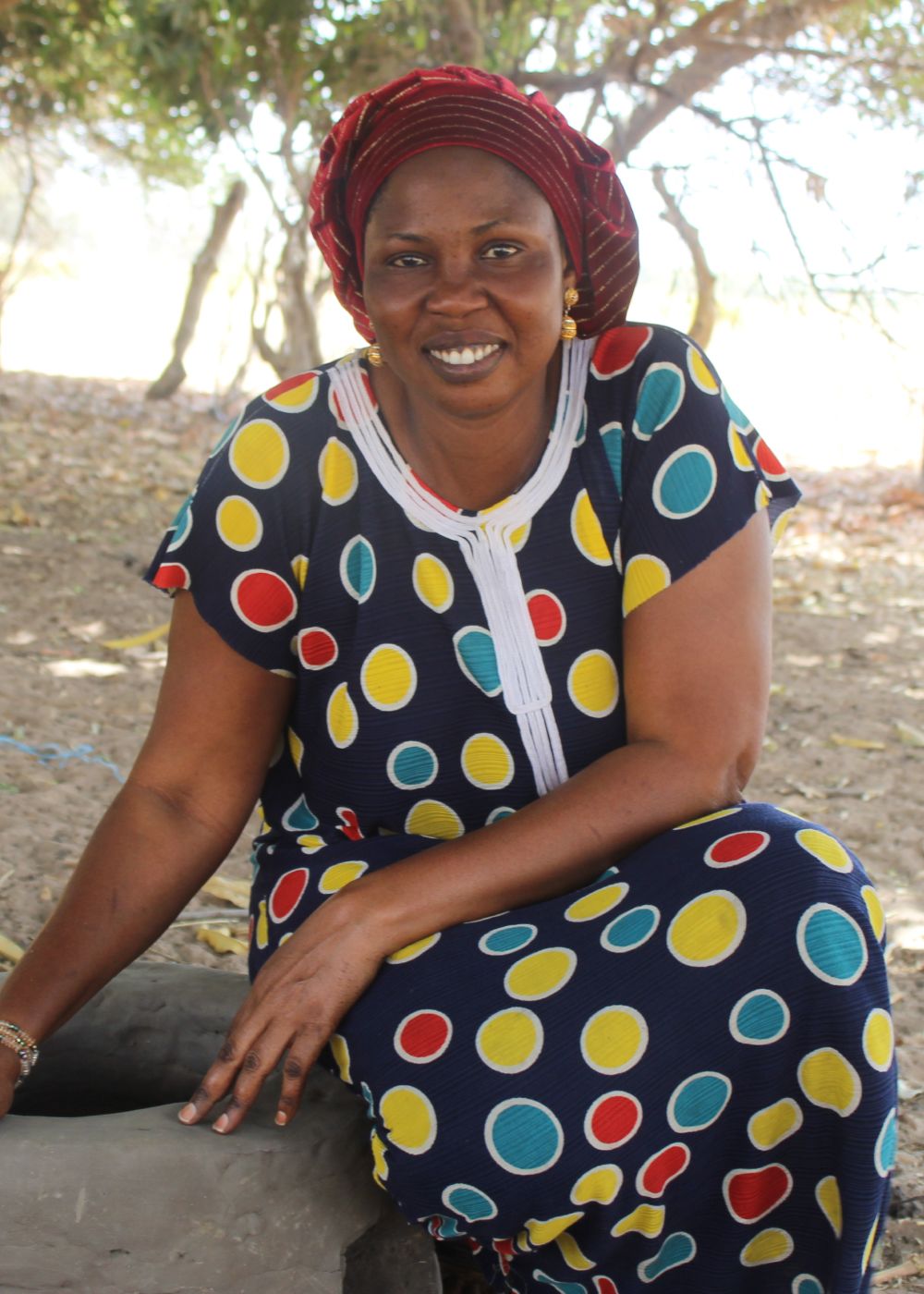 Mariama, with her new eco stove, is one of many women leading the way to address the effects of climate change in her community, and to provide alternative sources of income. Mame Sakou Sarr Ramadhan Kawanga/ActionAid
