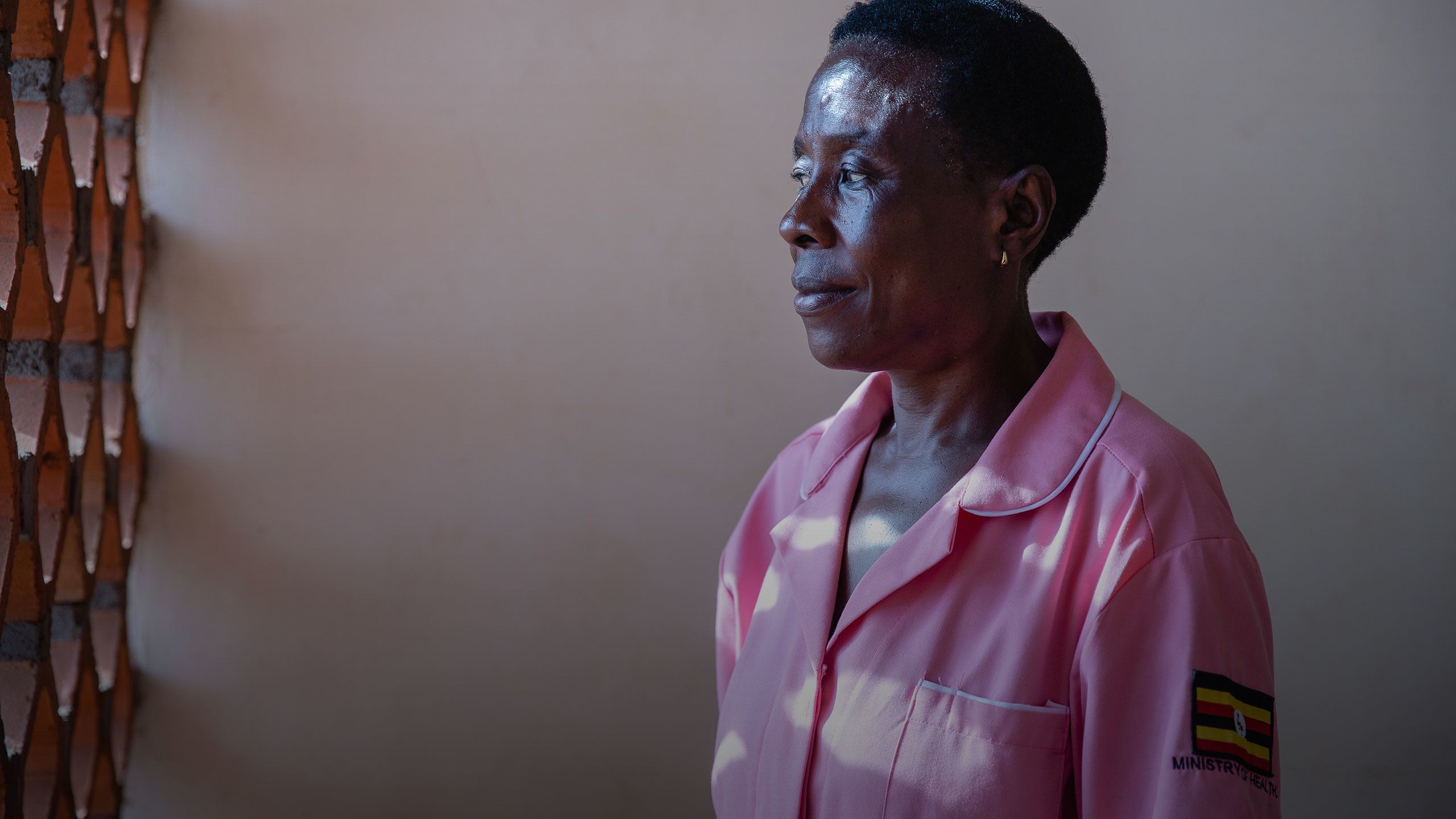 A portrait of Margaret at the health centre where she works