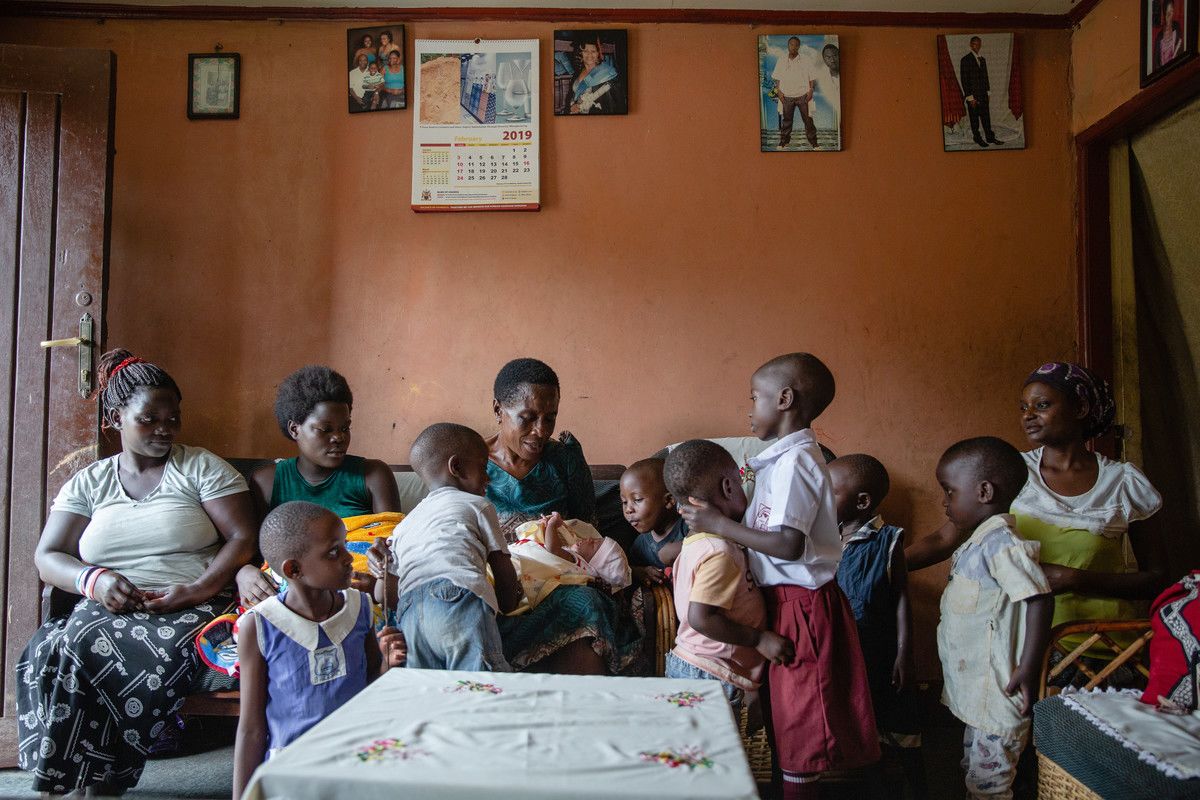 At home, Margaret interacts with her foster children and grandchildren