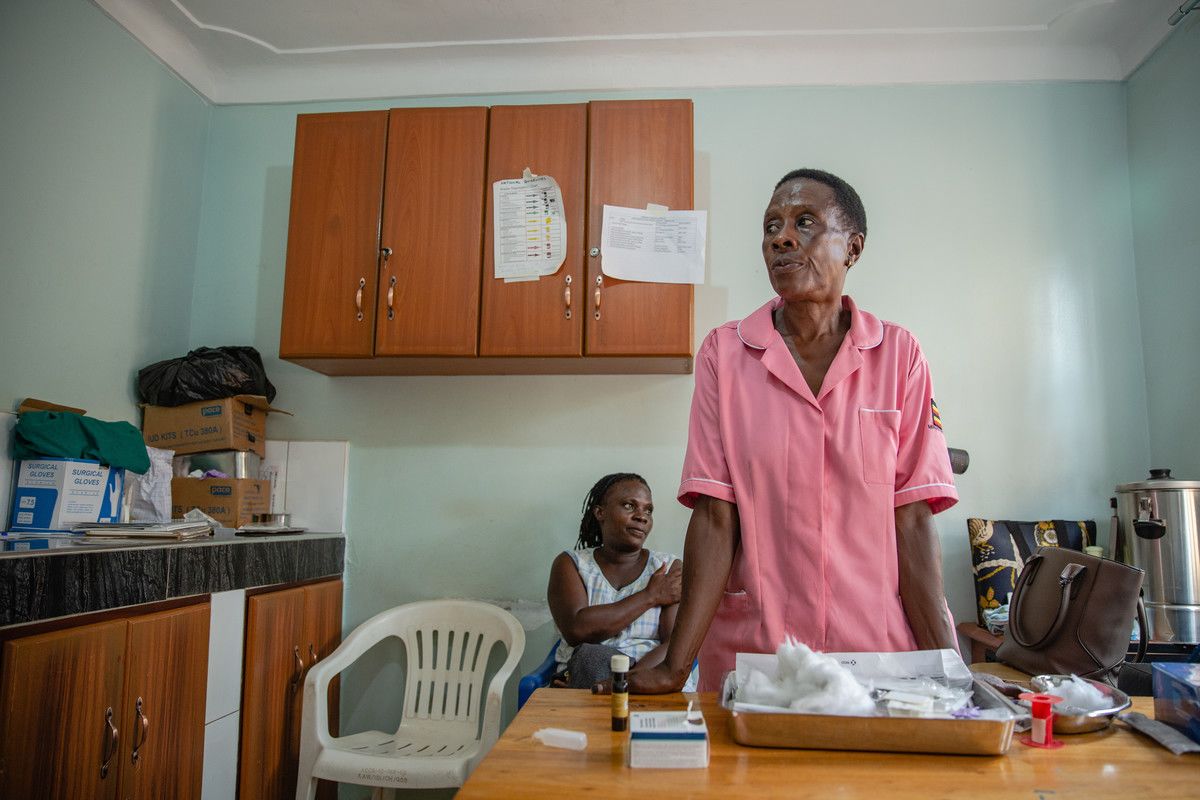 Margaret is pictured with a client in her office at the Kawaala Health Centre