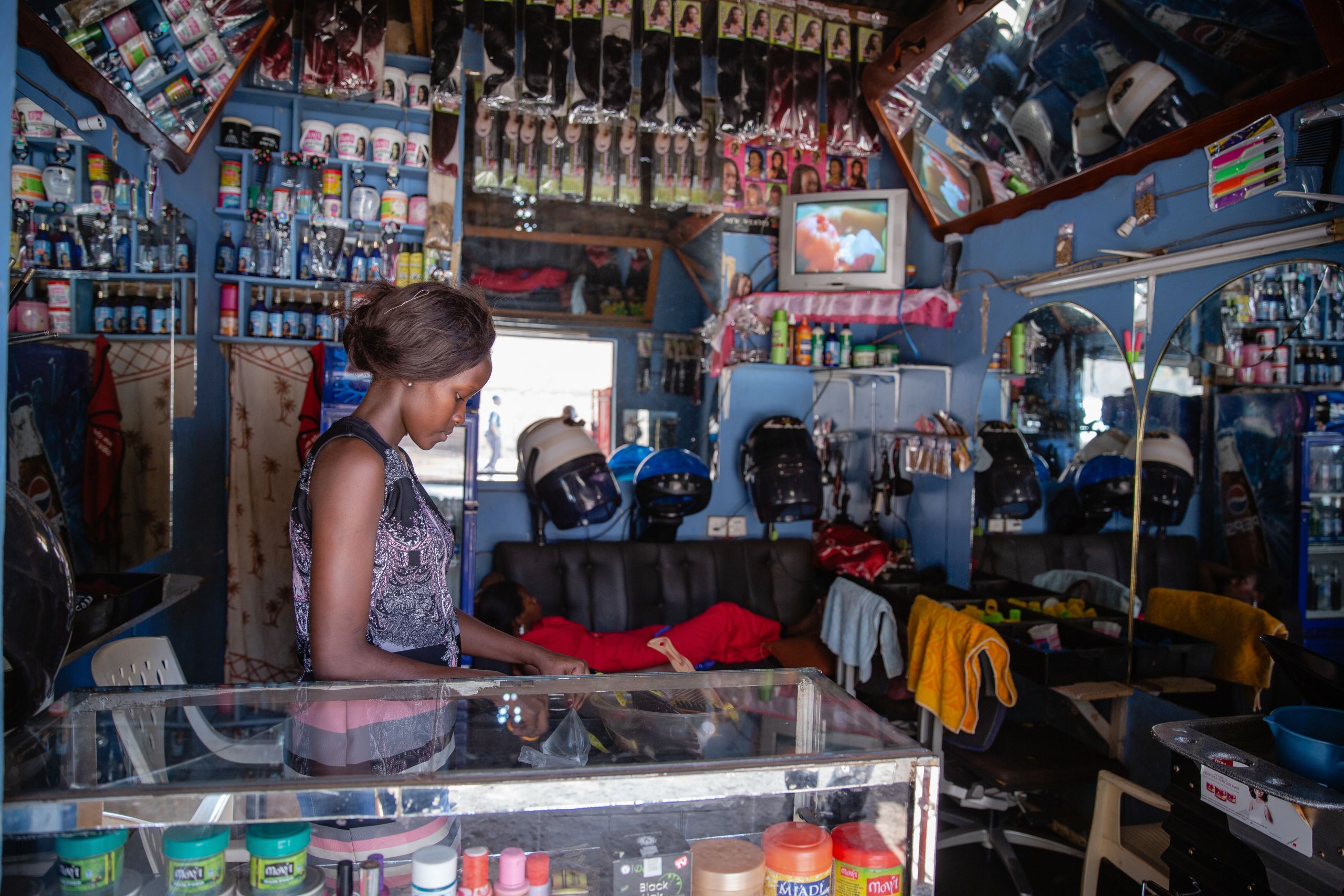 ActionAid's photographic campaign: Asiah's daughter at her home in Uganda